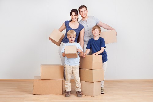 Careful loading of belongings during a Poplar removals service